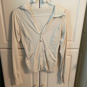 Cream colored Lululemon dance studio jacket